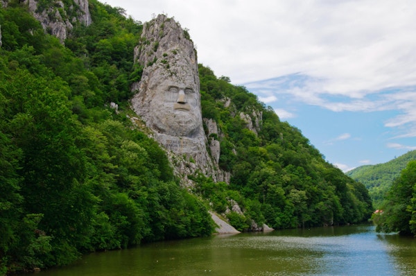 Carved portrait of Dacian king Decebal on Danube river ,Iron Gates Natural Park, Romania