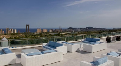 Lounge area with view over Benidorm skyline, seaview, Grand Luxor Hotel, Bendiorm, Alicante, Spanien