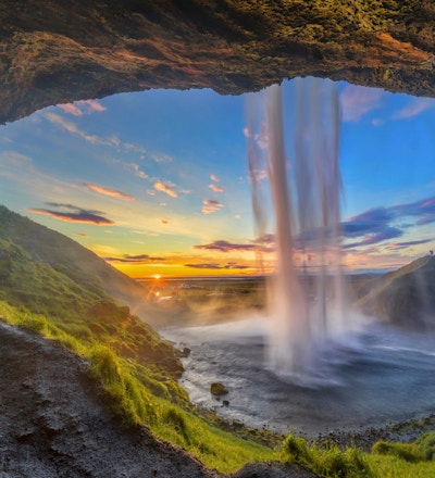 Behind the waterfall Seljalandsfoss Waterfall in Iceland Getty Images 849736360 1920x1280